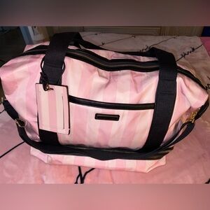Victoria secret iconic stripe pink travel bag w/ surprise clothing inside !